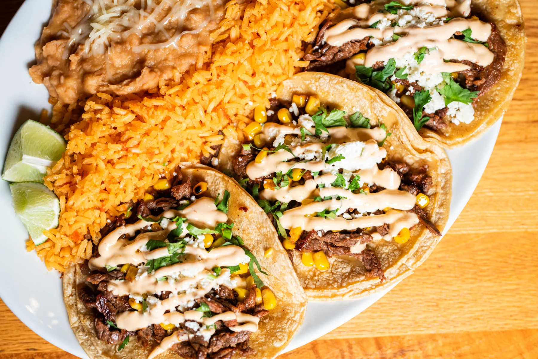 El Beso signature dishes ChimichangaTacos el BesoStreet Nachos﻿﻿﻿